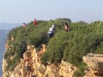 Climbers reaching top of Cap Canaille